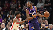 Feb 29, 2024; Phoenix, Arizona, USA; Houston Rockets guard Jalen Green (4) guards Phoenix Suns forward Kevin Durant (35) during the first half at Footprint Center. Mandatory Credit: Joe Camporeale-Imagn Images