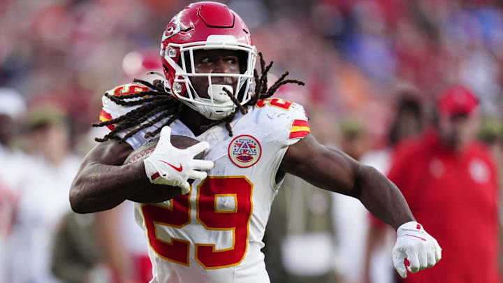 Nov 16, 2025; Denver, Colorado, USA; Kansas City Chiefs running back Kareem Hunt (29) carries the ball in the third quarter against the Denver Broncos at Empower Field at Mile High.
