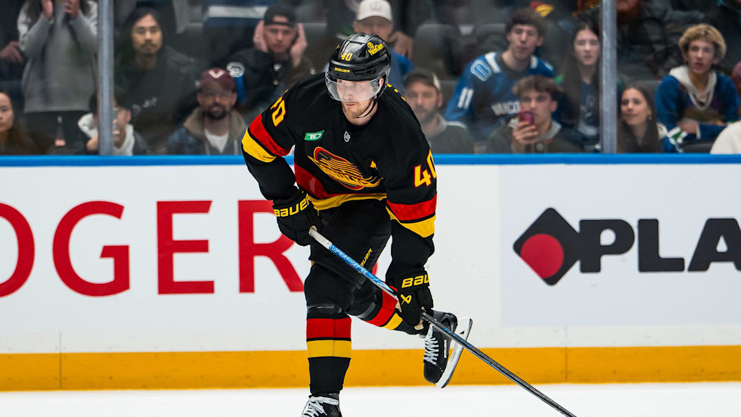 Jan 31, 2026; Vancouver, British Columbia, CAN; Vancouver Canucks forward Elias Pettersson (40) shoots against the Toronto Maple Leafs in overtime at Rogers Arena. Mandatory Credit: Bob Frid-Imagn Images