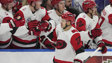 Nov 9, 2025; Toronto, Ontario, CAN; Carolina Hurricanes forward Logan Stankoven (22) gets congratulated after scoring the game winning goal against the Toronto Maple Leafs during the third period at Scotiabank Arena. Mandatory Credit: John E. Sokolowski-Imagn Images