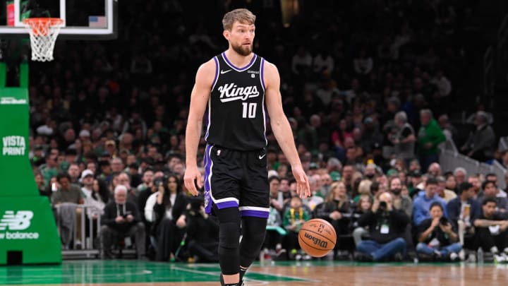 Apr 5, 2024; Boston, Massachusetts, USA; Sacramento Kings forward Domantas Sabonis (10) dribbles the ball against the Boston Celtics  during the second half at TD Garden. Mandatory Credit: Eric Canha-USA TODAY Sports