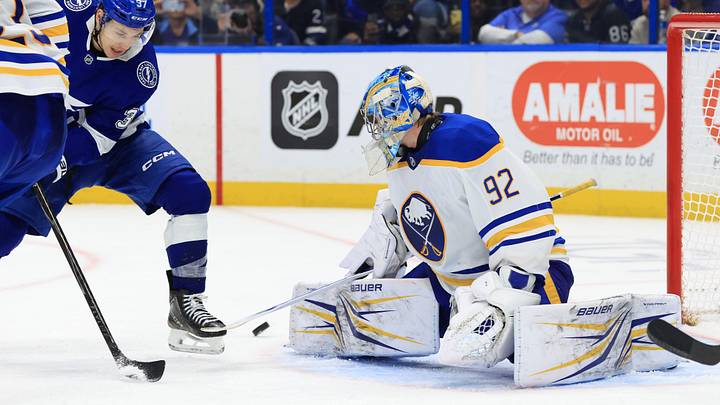 Feb 3, 2026; Tampa, Florida, USA; Tampa Bay Lightning center Yanni Gourde (37) shoots as Buffalo Sabres goaltender Colten Ellis (92) defends during the third period at Benchmark International Arena. Mandatory Credit: Kim Klement Neitzel-Imagn Images
