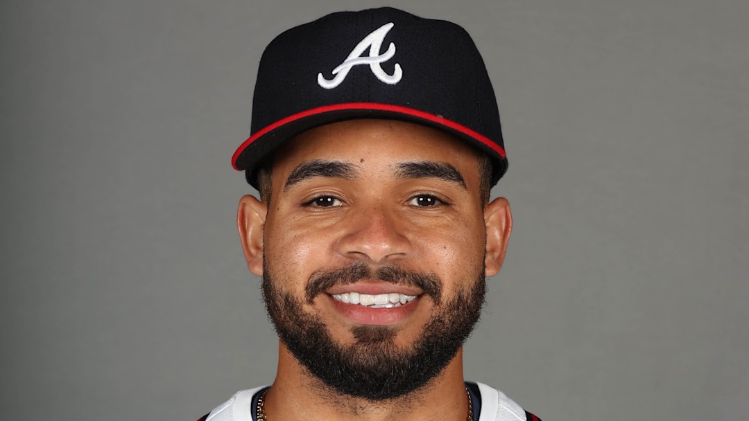 Atlanta Braves pitcher Domingo Gonzalez takes photos during media day Feb. 21 at CoolToday Park.