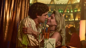 SENNA. (L to R) Gabriel Leone as Ayrton Senna, Julia Foti as Adriane Galisteu in Senna