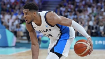 Jul 27, 2024; Villeneuve-d'Ascq, France; Greece small forward Giannis Antetokounmpo (34) controls the ball against Canada in the second half during the Paris 2024 Olympic Summer Games at Stade Pierre-Mauroy. Mandatory Credit: John David Mercer-USA TODAY Sports