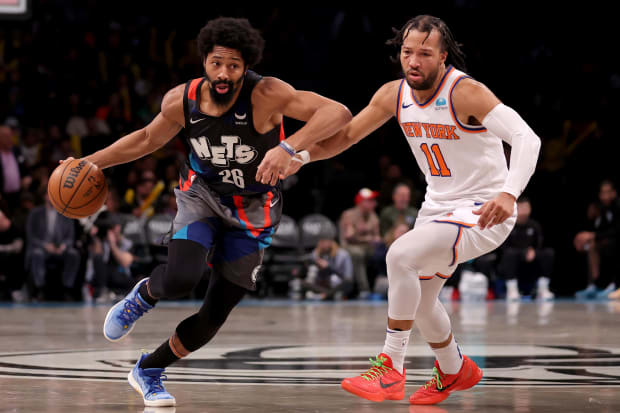 Dec 20, 2023; Brooklyn, New York, USA; Brooklyn Nets guard Spencer Dinwiddie (26) drives to the basket against New York Knicks guard Jalen Brunson (11) during the third quarter at Barclays Center. Mandatory Credit: Brad Penner-USA TODAY Sports