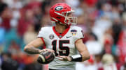 Dec 30, 2023; Miami Gardens, FL, USA; Georgia Bulldogs quarterback Carson Beck (15) drops back to pass against the Florida State Seminoles during the first half in the 2023 Orange Bowl at Hard Rock Stadium. Mandatory Credit: Nathan Ray Seebeck-USA TODAY Sports