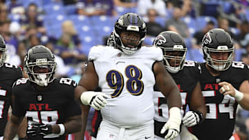 Aug 17, 2024; Baltimore, Maryland, USA;  Baltimore Ravens defensive tackle Travis Jones (98) reacts during the first half against the Atlanta Falcons at M&T Bank Stadium. Mandatory Credit: Tommy Gilligan-Imagn Images