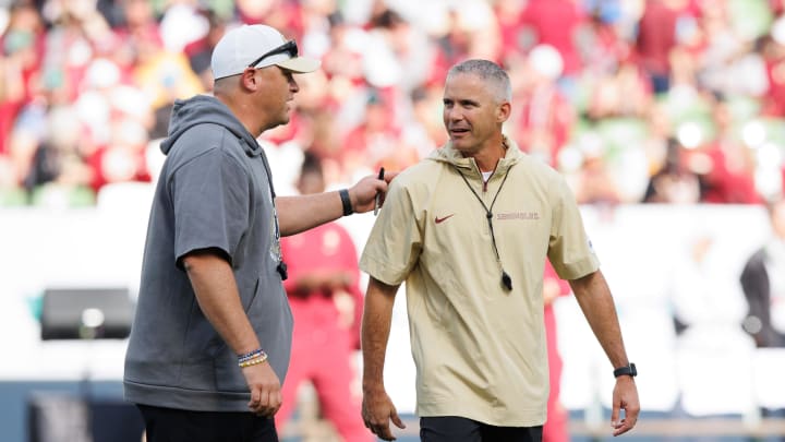 Aug 24, 2024; Dublin, IRL; Georgia Tech head coach Brent Key and Florida State University head coach Mike Norvell before the game at Aviva Stadium. Mandatory Credit: Tom Maher/INPHO via USA TODAY Sports