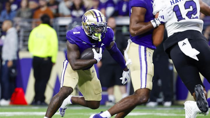 Aug 31, 2024; Seattle, Washington, USA; Washington Huskies running back Jonah Coleman (1) rushes for a touchdown against the Weber State Wildcats during the third quarter at Alaska Airlines Field at Husky Stadium. Mandatory Credit: Joe Nicholson-Imagn Images