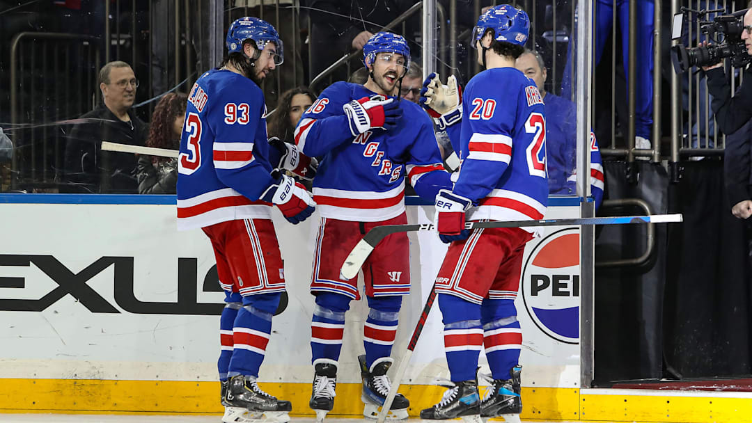 Feb 2, 2025; New York, New York, USA; New York Rangers center Mika Zibanejad (93) celebrates with center Vincent Trocheck (16) and left wing Chris Kreider (20) after a 4-2 victory against the Vegas Golden Knights at Madison Square Garden. Mandatory Credit: Danny Wild-Imagn Images