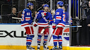 Feb 2, 2025; New York, New York, USA; New York Rangers center Mika Zibanejad (93) celebrates with center Vincent Trocheck (16) and left wing Chris Kreider (20) after a 4-2 victory against the Vegas Golden Knights at Madison Square Garden. Mandatory Credit: Danny Wild-Imagn Images