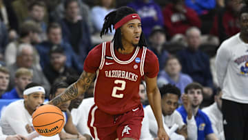 Mar 20, 2025; Providence, RI, USA;  Arkansas Razorbacks guard Boogie Fland (2) dribbles the ball during the first half against the Kansas Jayhawks at Amica Mutual Pavilion. Mandatory Credit: Eric Canha-Imagn Images