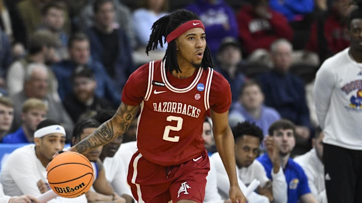 Mar 20, 2025; Providence, RI, USA;  Arkansas Razorbacks guard Boogie Fland (2) dribbles the ball during the first half against the Kansas Jayhawks at Amica Mutual Pavilion. Mandatory Credit: Eric Canha-Imagn Images