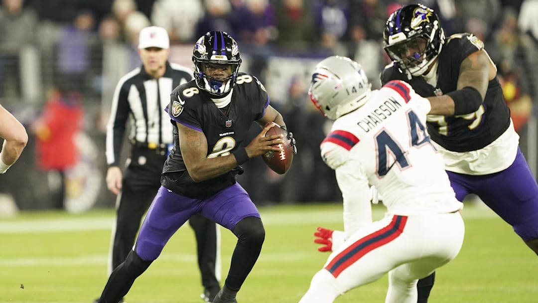 Lamar Jackson exited Sunday’s game vs. the Patriots with a back injury.