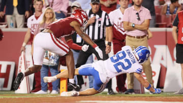 Parker Kingston (82) scores a touchdown against Arkansas