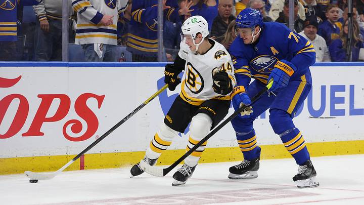 Apr 19, 2026; Buffalo, New York, USA; Boston Bruins center James Hagens (44) tries to control the puck as Buffalo Sabres center Tage Thompson (72) defends during the third period in game one of the first round of the 2026 Stanley Cup Playoffs at KeyBank Center. Mandatory Credit: Timothy T. Ludwig-Imagn Images Apr 19, 2026; Buffalo, New York, USA; Boston Bruins center James Hagens (44) tries to control the puck as Buffalo Sabres center Tage Thompson (72) defends during the third period in game one of the first round of the 2026 Stanley Cup Playoffs at KeyBank Center. Mandatory Credit: Timothy T. Ludwig-Imagn Images