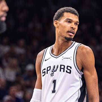 Nov 2, 2025; Phoenix, Arizona, USA; San Antonio Spurs forward Victor Wembanyama (1) reacts after a drawing a foul in the second half against the Phoenix Suns at Mortgage Matchup Center.