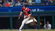 American League Future  infielder Marcelo Mayer (10) reacts while running to second base with a double during the game against the American League Future team during the Major league All-Star Futures game at Globe Life Field in 2024.