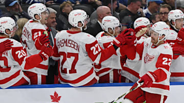 Oct 13, 2025; Toronto, Ontario, CAN; Detroit Red Wings center Mason Appleton (22) celebrates his goal against the Toronto Maple Leafs at the bench in the third period at Scotiabank Arena. Mandatory Credit: Gerry Angus-Imagn Images
