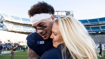 Penn State senior tight end Theo Johnson hugs his mom, Amy Johnson.