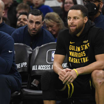 Golden State Warriors guard Stephen Curry (30) sits on the bench during the second half against the Boston Celtics at TD Garden. Mandatory Credit: