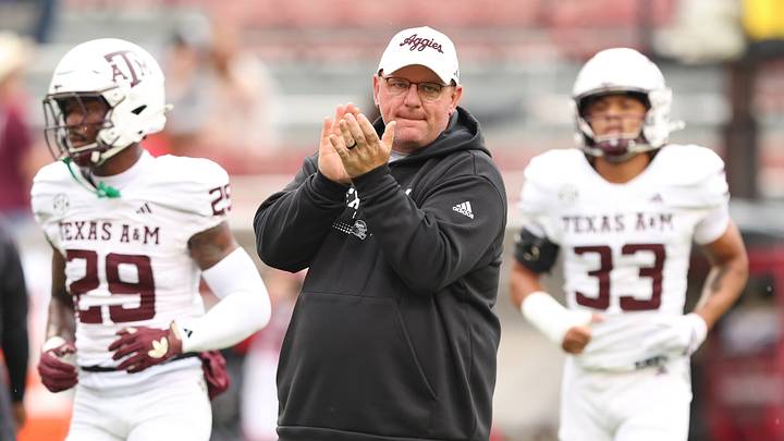 Oct 18, 2025; Fayetteville, Arkansas, USA; Texas A&M Aggies head coach Mike Elko prior to the game against the Arkansas Razorbacks at Donald W. Reynolds Razorback Stadium. Mandatory Credit: Nelson Chenault-Imagn Images