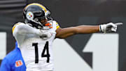 Pittsburgh Steelers wide receiver George Pickens (14) celebrates his first down reception during the fourth quarter against the Cincinnati Bengals at Paycor Stadium.