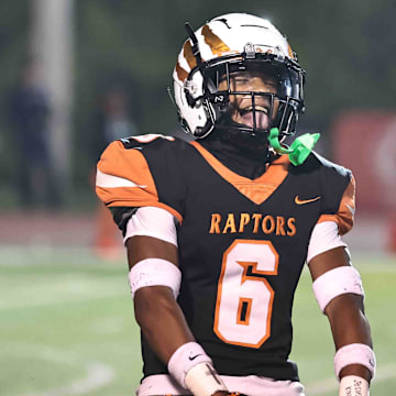 Anderson Raptors defensive back Ace Alston (6) celebrates during their regional championship win over Withrow 49-28 Friday, Nov. 17, 2023.