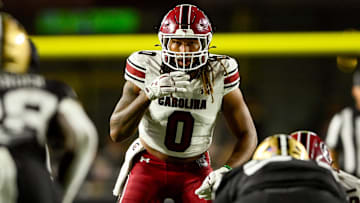 Nov 9, 2024; Nashville, Tennessee, USA;  South Carolina Gamecocks linebacker Debo Williams (0) looks into the backfield against the Vanderbilt Commodores during the first half at FirstBank Stadium. Mandatory Credit: Steve Roberts-Imagn Images