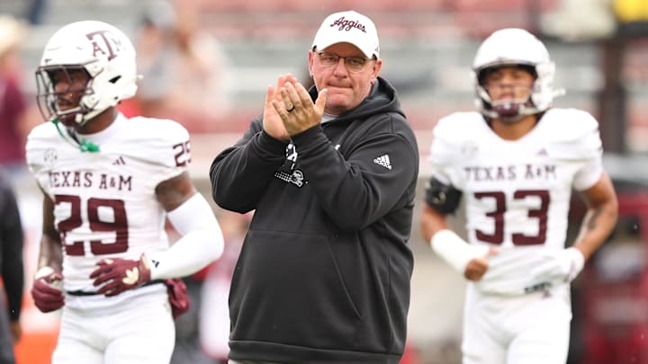 Oct 18, 2025; Fayetteville, Arkansas, USA; Texas A&M Aggies head coach Mike Elko prior to the game against the Arkansas Razorbacks at Donald W. Reynolds Razorback Stadium. Mandatory Credit: Nelson Chenault-Imagn Images