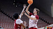 Indiana basketball forward Reed Bailey shoots over forward Sam Alexis in practice Sept. 30, 2025, at Assembly Hall.