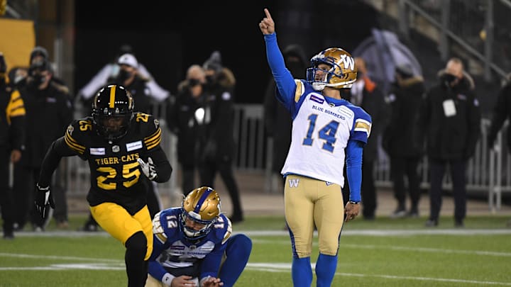 Dec 12, 2021; Hamilton, Ontario, CAN; Winnipeg Blue Bombers kicker Sergio Castillo (14) reacts after kicking a field goal against the Hamilton Tiger-Cats during the 108th Grey Cup football game at Tim Hortons Field. Mandatory Credit: Dan Hamilton-Imagn Images Dec 12, 2021; Hamilton, Ontario, CAN; Winnipeg Blue Bombers kicker Sergio Castillo (14) reacts after kicking a field goal against the Hamilton Tiger-Cats during the 108th Grey Cup football game at Tim Hortons Field. Mandatory Credit: Dan Hamilton-Imagn Images
