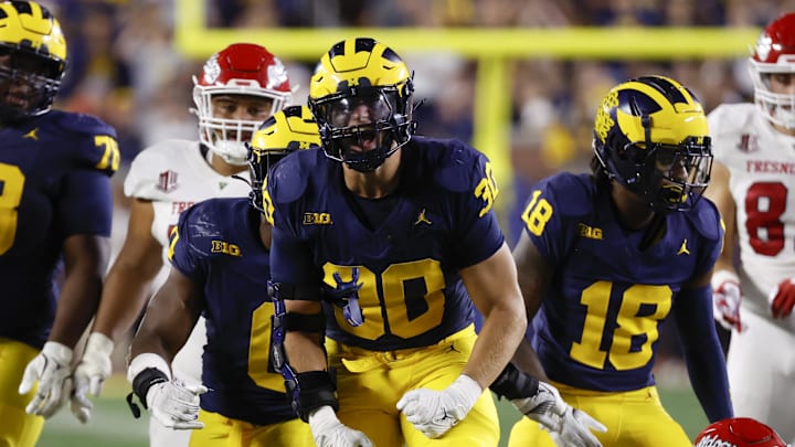 Aug 31, 2024; Ann Arbor, Michigan, USA;  Michigan Wolverines linebacker Jimmy Rolder (30) celebrates a play in the second half against the Fresno State Bulldogs at Michigan Stadium. Mandatory Credit: Rick Osentoski-Imagn Images