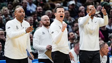 From left, Michigan State assistant coaches Thomas Kelley, Jon Borovich, and Saddi Washington celebrate a play against Bryant during the second half of the First Round of NCAA Tournament at Rocket Arena in Cleveland, Ohio on Friday, March 21, 2025.
