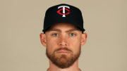 Feb 22, 2024; Lee County, FL, USA;  Minnesota Twins relief pitcher Josh Staumont (63) poses for a