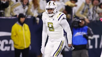 Nov 21, 2024; Atlanta, Georgia, USA; Georgia Tech Yellow Jackets defensive lineman Romello Height (9) celebrates after an interception against the North Carolina State Wolfpack in the fourth quarter at Bobby Dodd Stadium at Hyundai Field. Mandatory Credit: Brett Davis-Imagn Images
