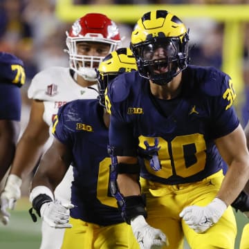 Aug 31, 2024; Ann Arbor, Michigan, USA;  Michigan Wolverines linebacker Jimmy Rolder (30) celebrates a play in the second half against the Fresno State Bulldogs at Michigan Stadium. Mandatory Credit: Rick Osentoski-USA TODAY Sports