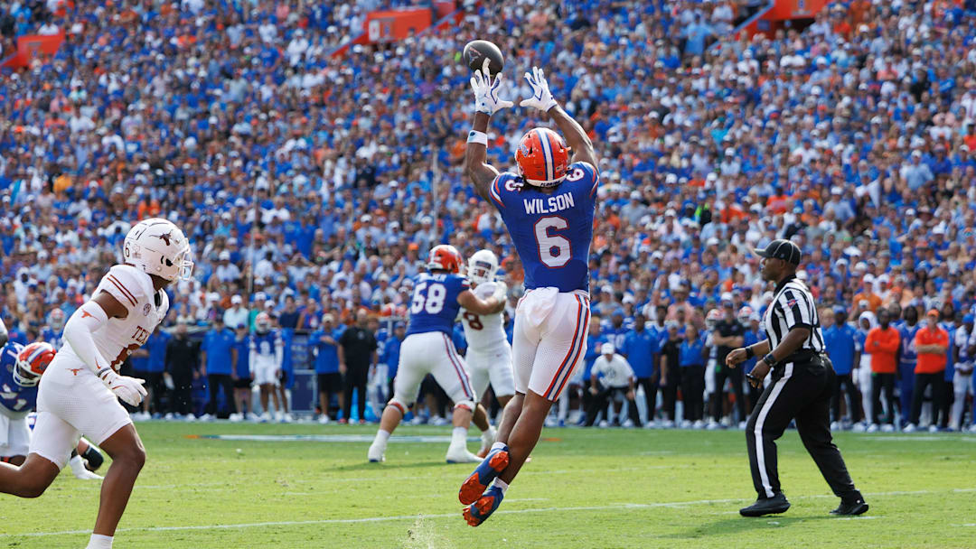 Oct 4, 2025; Gainesville, Florida, USA; Florida Gators wide receiver Dallas Wilson (6) makes a catch for a touchdown against the Texas Longhorns during the first half at Ben Hill Griffin Stadium. Mandatory Credit: Matt Pendleton-Imagn Images