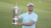 Jun 18, 2023; Los Angeles, California, USA; Wyndham Clark poses with the championship trophy after winning the U.S. Open golf tournament at Los Angeles Country Club. Mandatory Credit: Michael Madrid-USA TODAY Sports
