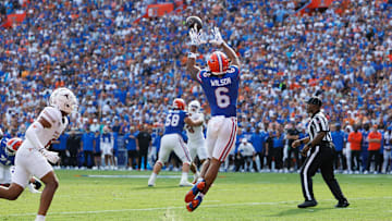 Oct 4, 2025; Gainesville, Florida, USA; Florida Gators wide receiver Dallas Wilson (6) makes a catch for a touchdown against the Texas Longhorns during the first half at Ben Hill Griffin Stadium. Mandatory Credit: Matt Pendleton-Imagn Images