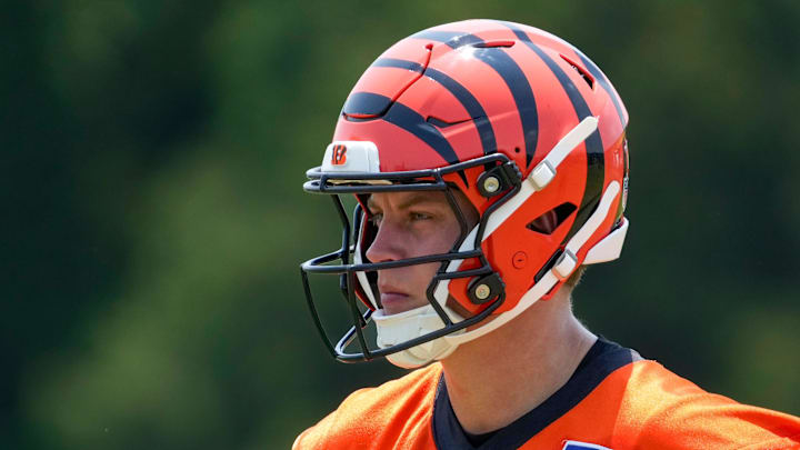 Cincinnati Bengals quarterback Joe Burrow (9) looks on between plays during a session of organized team activities on the Bengals practice field at Paycor Stadium in downtown Cincinnati on Tuesday, June 3, 2025. Cincinnati Bengals quarterback Joe Burrow (9) looks on between plays during a session of organized team activities on the Bengals practice field at Paycor Stadium in downtown Cincinnati on Tuesday, June 3, 2025.