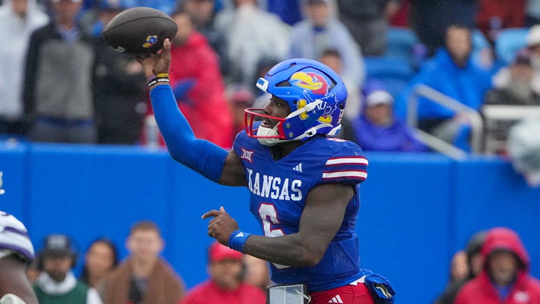 Oct 25, 2025; Lawrence, Kansas, USA; Kansas Jayhawks quarterback Jalon Daniels (6) throws a pass against the during the first half of the game at David Booth Kansas Memorial Stadium. Oct 25, 2025; Lawrence, Kansas, USA; Kansas Jayhawks quarterback Jalon Daniels (6) throws a pass against the during the first half of the game at David Booth Kansas Memorial Stadium.