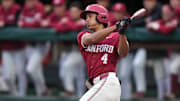 Mar 1, 2025; Stanford, CA, USA; Stanford Cardinal left fielder Tatum Marsh (4) hits a double against the Xavier Musketeers during the third inning at Sunken Diamond. Mandatory Credit: Darren Yamashita-Imagn Images