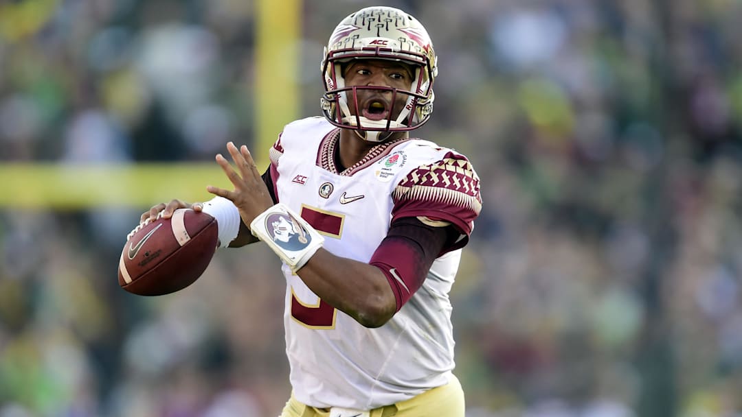 January 1, 2015; Pasadena, CA, USA; Florida State Seminoles quarterback Jameis Winston (5) runs the ball against the Oregon Ducks in the 2015 Rose Bowl college football game at Rose Bowl. Mandatory Credit: Gary A. Vasquez-Imagn Images