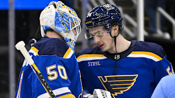 Nov 3, 2025; St. Louis, Missouri, USA; St. Louis Blues right wing Dalibor Dvorsky (54) celebrates with goaltender Jordan Binnington (50) after the Blues defeated the Edmonton Oilers at Enterprise Center. Mandatory Credit: Jeff Curry-Imagn Images