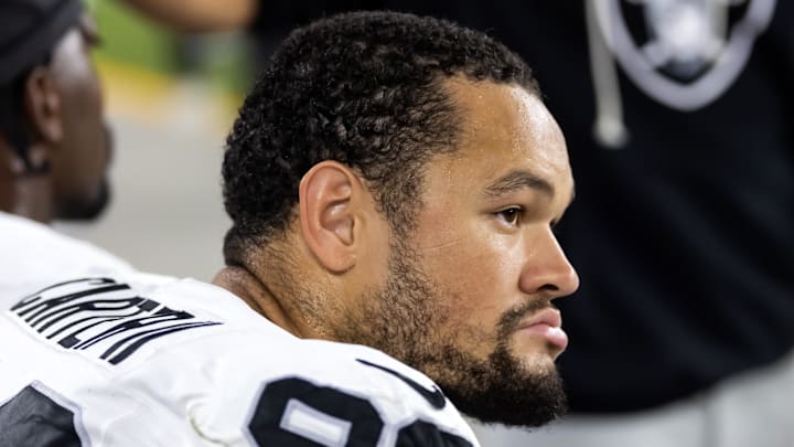 Aug 23, 2025; Glendale, Arizona, USA; Las Vegas Raiders defensive end Andre Carter II (99) against the Arizona Cardinals during a preseason NFL game at State Farm Stadium. Mandatory Credit: Mark J. Rebilas-Imagn Images