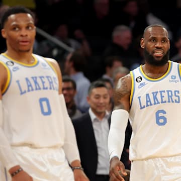 Jan 31, 2023; New York, New York, USA; Los Angeles Lakers forward LeBron James (6) and guard Russell Westbrook (0) react during overtime against the New York Knicks at Madison Square Garden. Mandatory Credit: Brad Penner-Imagn Images