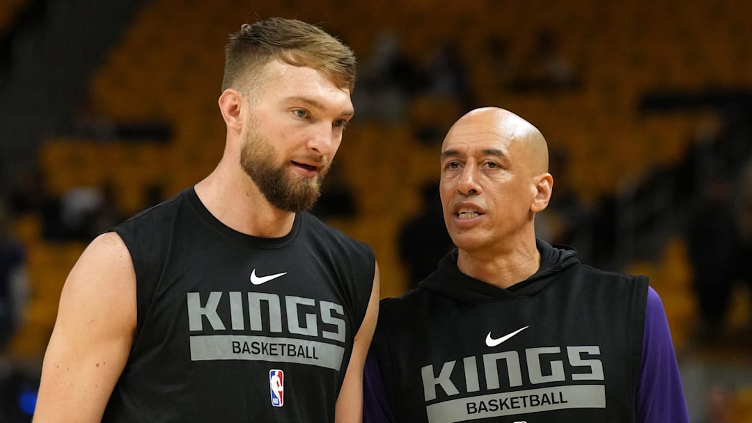 Apr 23, 2023; San Francisco, California, USA; Sacramento Kings forward Domantas Sabonis (left) and assistant coach Doug Christie (right) talk before game four of the 2023 NBA playoffs against the Golden State Warriors at Chase Center. Mandatory Credit: Darren Yamashita-Imagn Images
