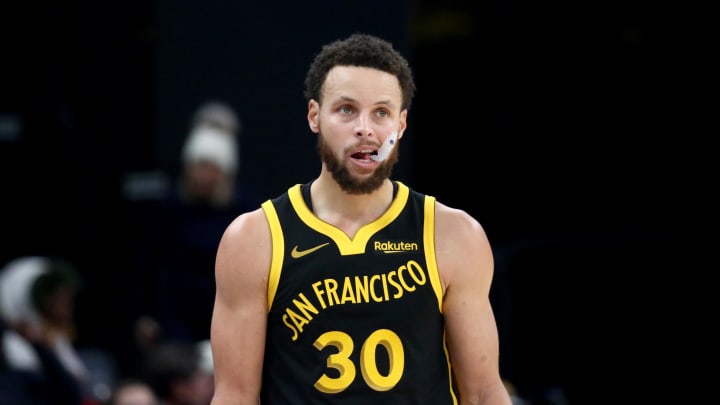 Jan 15, 2024; Memphis, Tennessee, USA; Golden State Warriors guard Stephen Curry (30) reacts during the second half against the Memphis Grizzlies at FedExForum. 